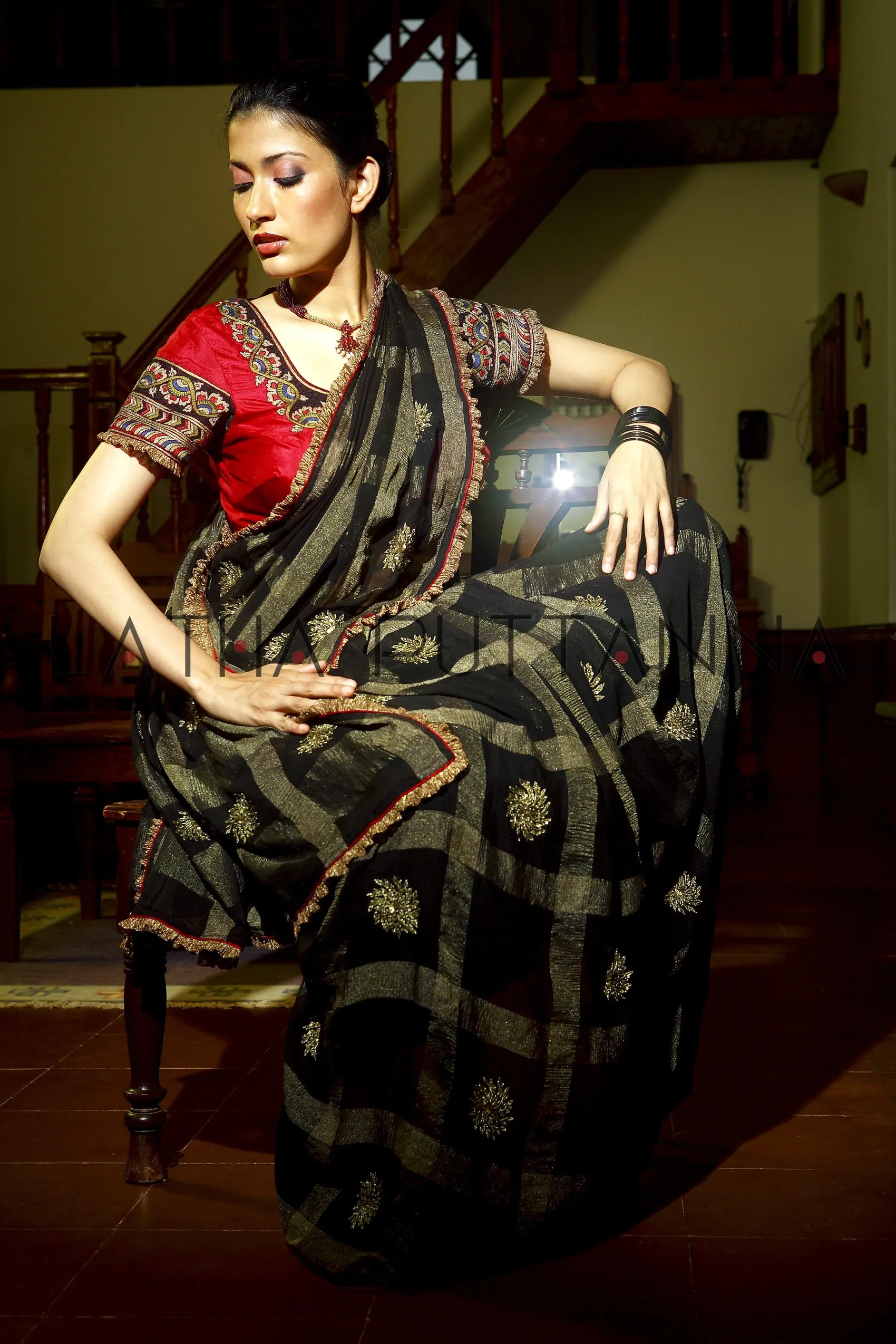 Mysore -  Black georgette saree with gold squares